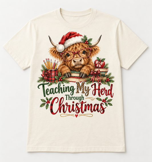 Teaching My Herd Through Christmas — Highland Cow Teacher Christmas Tee mockup