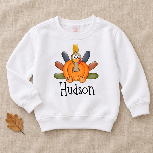 Hudson Personalized Pumpkin Turkey Kids Tee — artwork preview on sweatshirt; product sold as short-sleeve tee