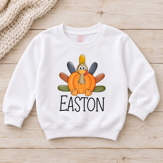 Easton Personalized Pumpkin Turkey Kids Tee — artwork preview on sweatshirt; product sold as short-sleeve tee