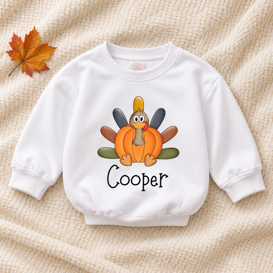 Cooper Personalized Pumpkin Turkey Kids Tee — artwork preview on sweatshirt; product sold as short-sleeve tee